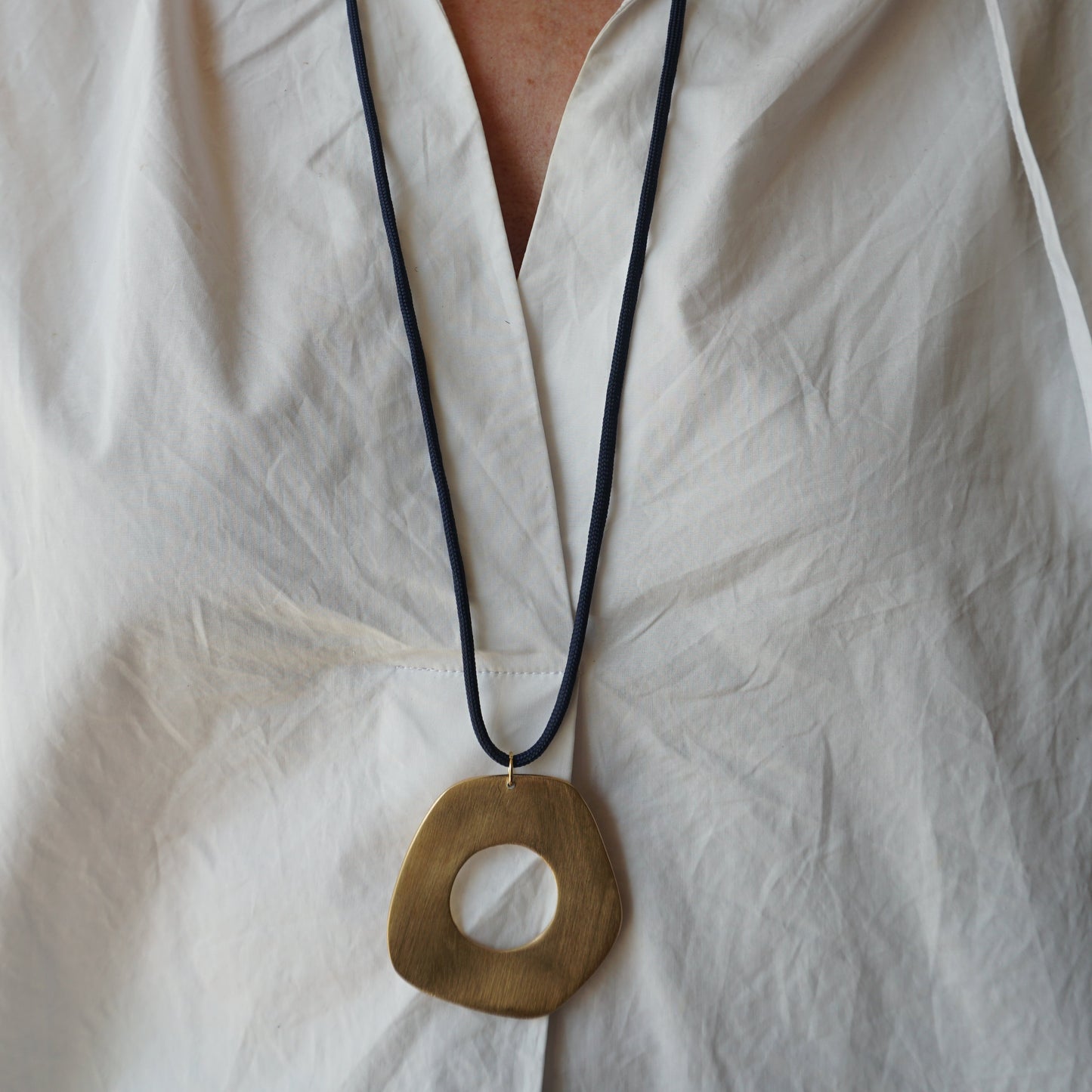 Collar de cordón Placa geométrica
