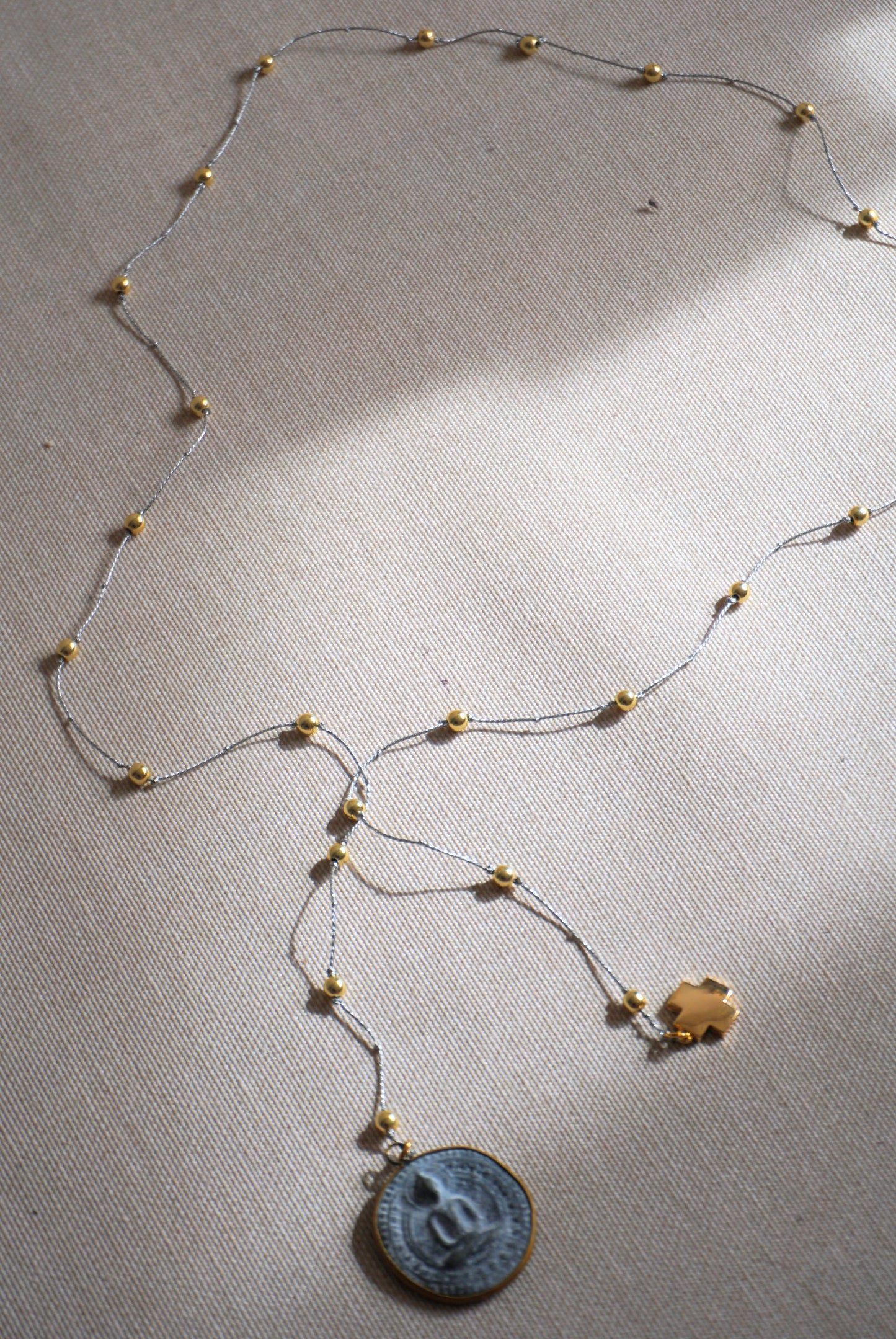 Tira Buda con cruz nácar