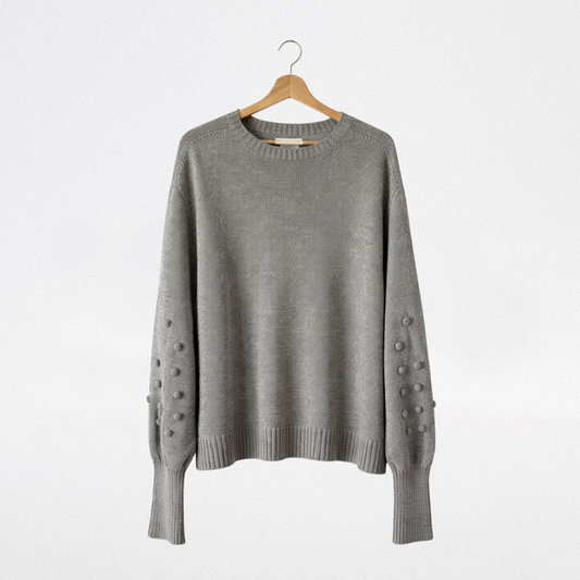 Maglia grigia con noccioline in rilievo