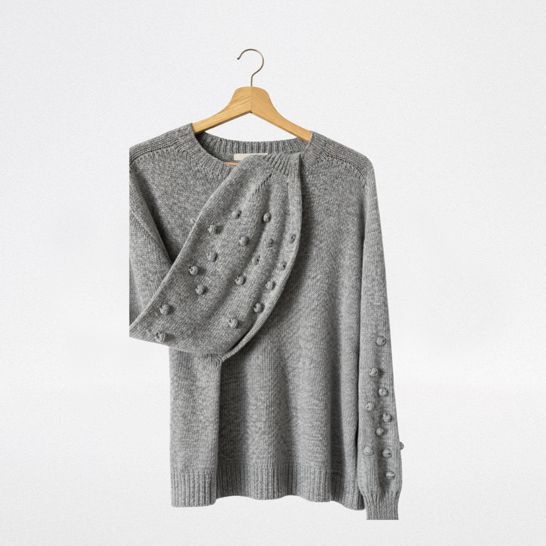 Maglia grigia con noccioline in rilievo