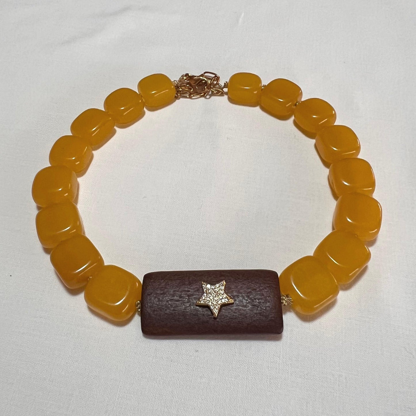 Collana corta in calcedonio e legno con stella
