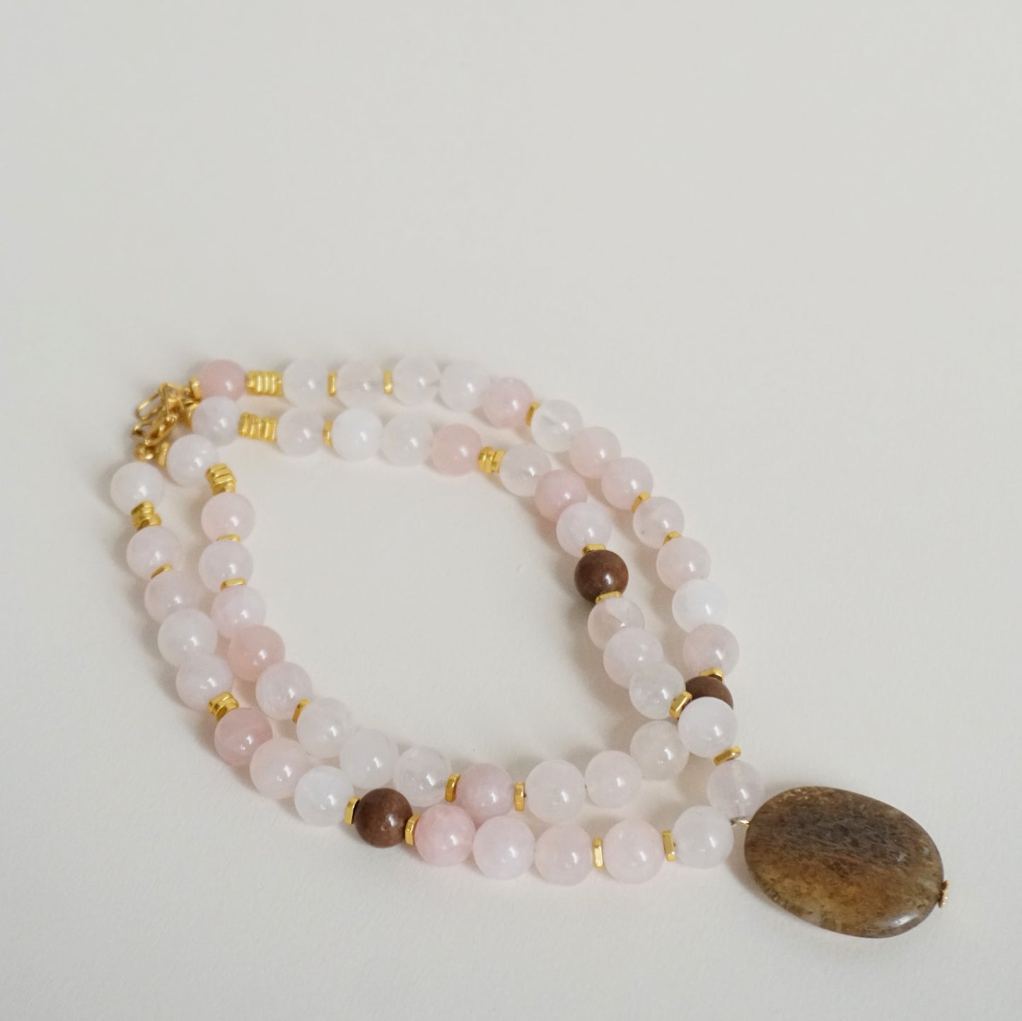Collana doppia con pietra marrone e stella