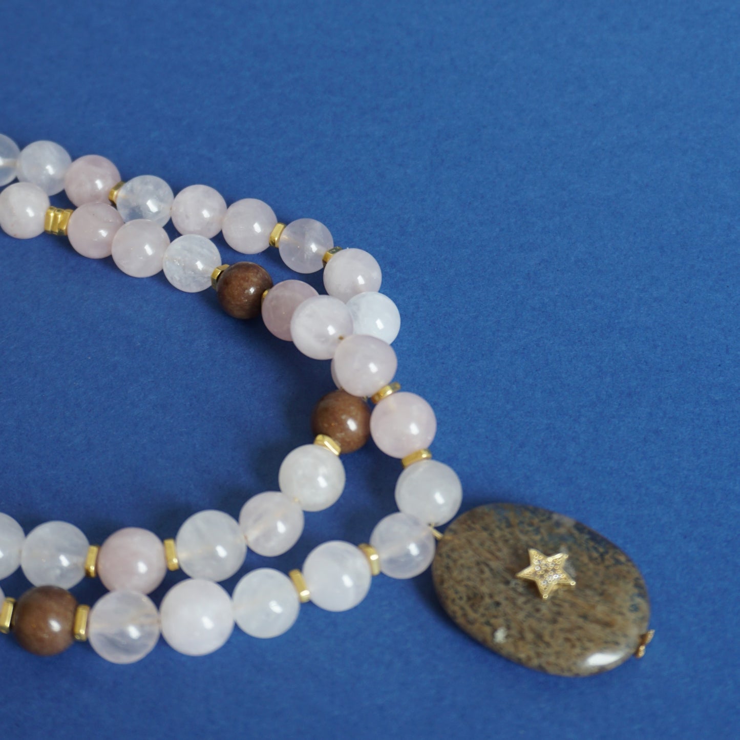 Collana doppia con pietra marrone e stella