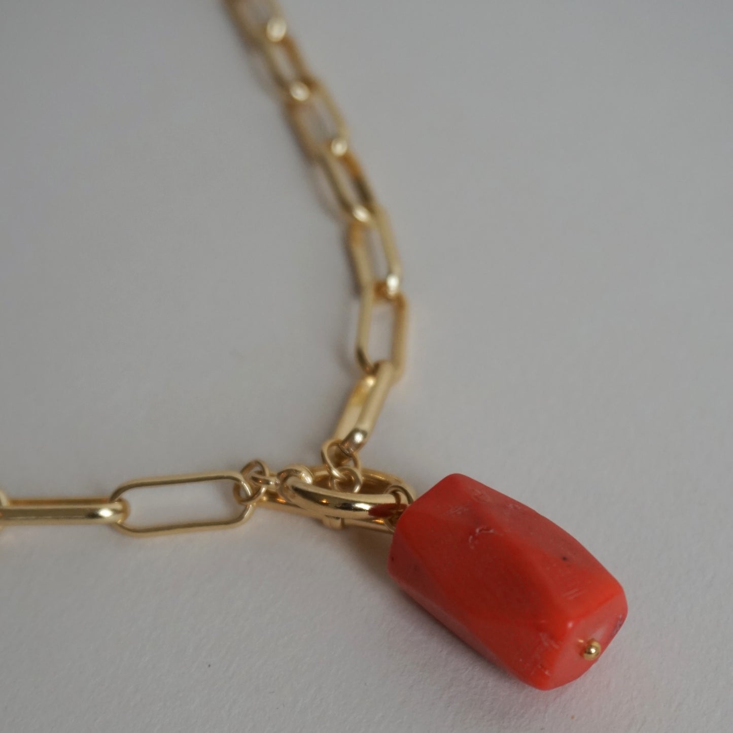 Collana maglie larghe e corallo arancione