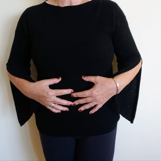 Maglia con maniche aperte 