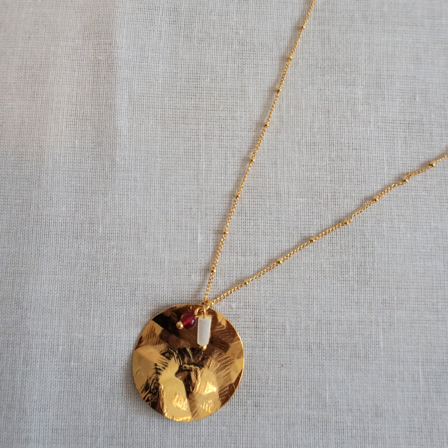 Collana lunga placca dorata