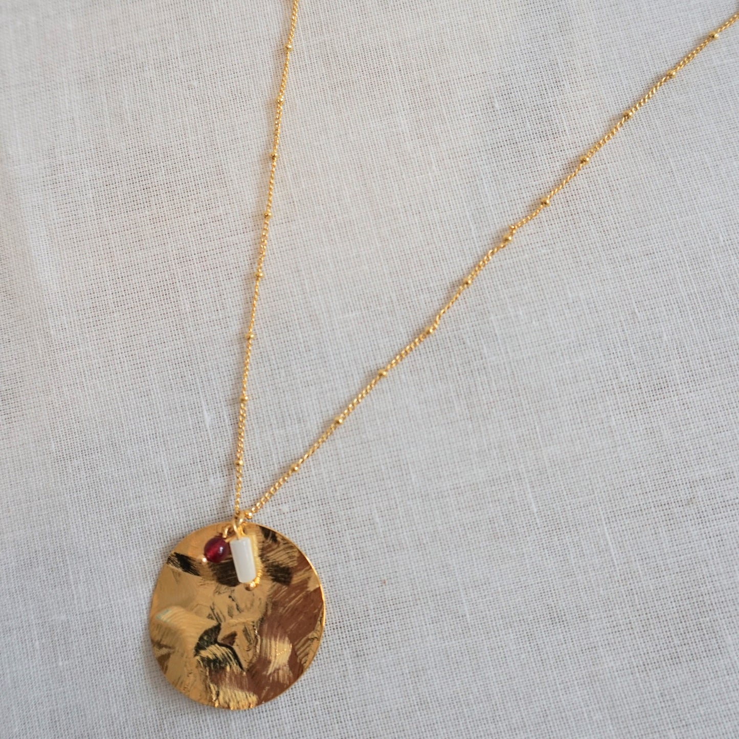 Collana lunga placca dorata