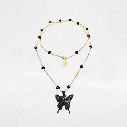 Collana lunga con farfalla nera